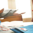 artisanal game pouchs, made with upcycledd alcantara fabric, with recycled natural leather